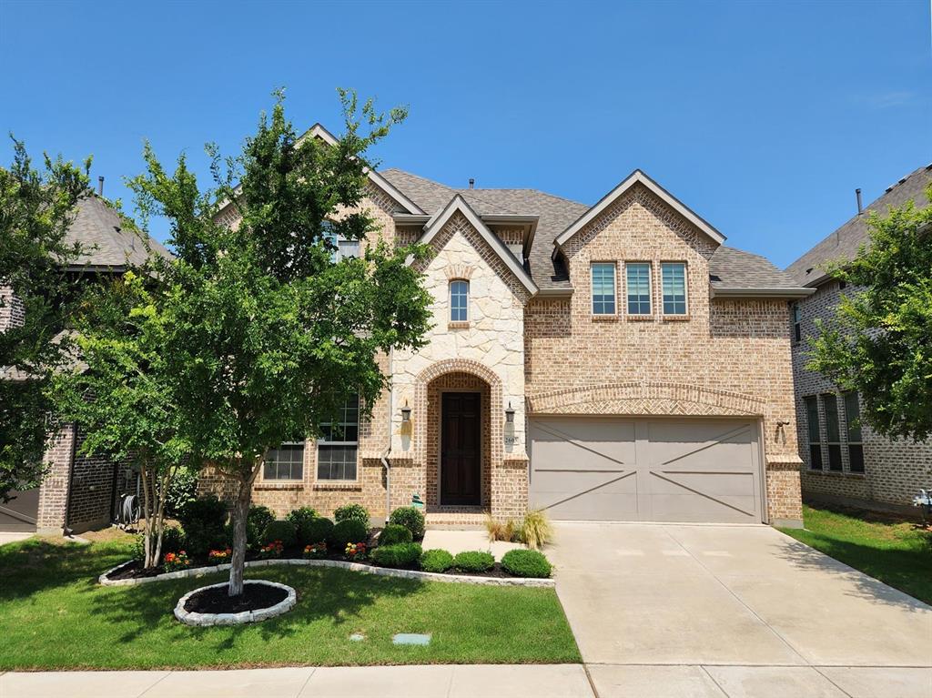 2605 San Jacinto Drive Euless, TX 76039 - Photo 1 of 1 a front view of a house with garden