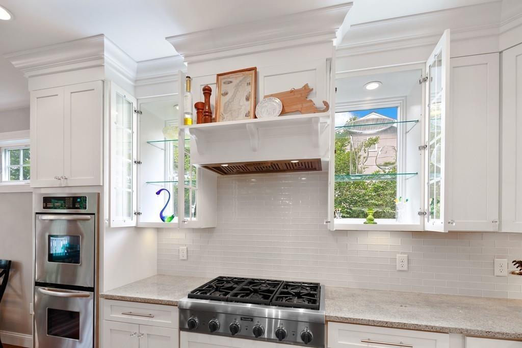 41 Kimball Beach Road Hingham, MA 02043 - Photo 11 of 42 a kitchen with a stove and a refrigerator