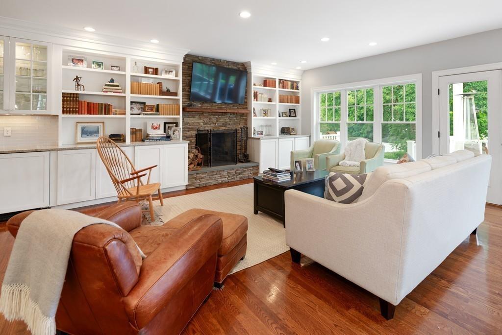 41 Kimball Beach Road Hingham, MA 02043 - Photo 17 of 42 a living room with furniture a fireplace and a large window
