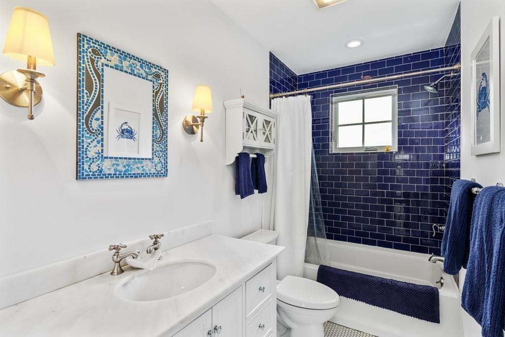 41 Kimball Beach Road Hingham, MA 02043 - Photo 28 of 42 a bathroom with a sink toilet and shower