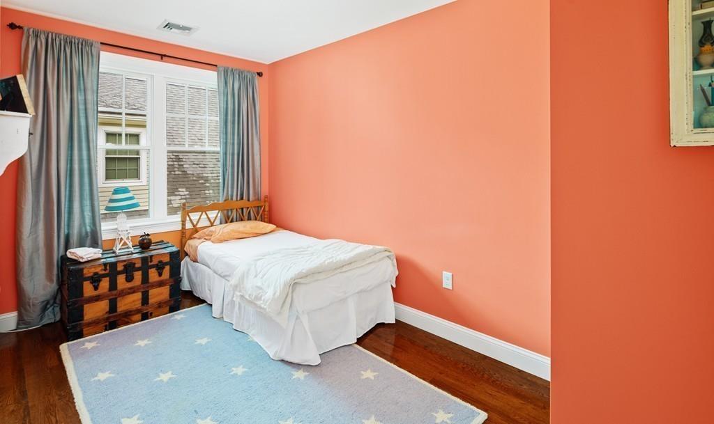 41 Kimball Beach Road Hingham, MA 02043 - Photo 29 of 42 a bedroom with a bed and windows