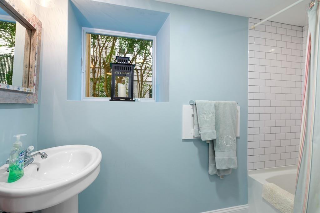 41 Kimball Beach Road Hingham, MA 02043 - Photo 33 of 42 a bathroom with a sink and bathtub