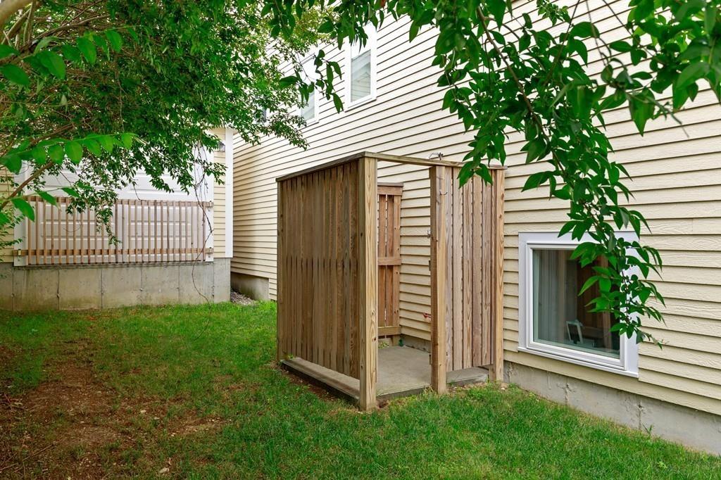 41 Kimball Beach Road Hingham, MA 02043 - Photo 37 of 42 a view of a porch with a door and wooden fence