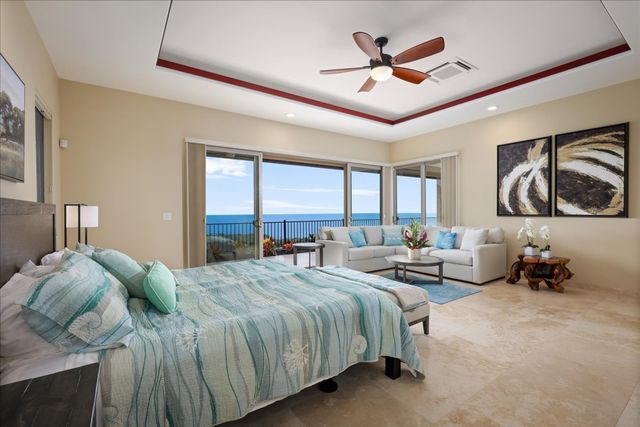 a bedroom with a bed and a large bed