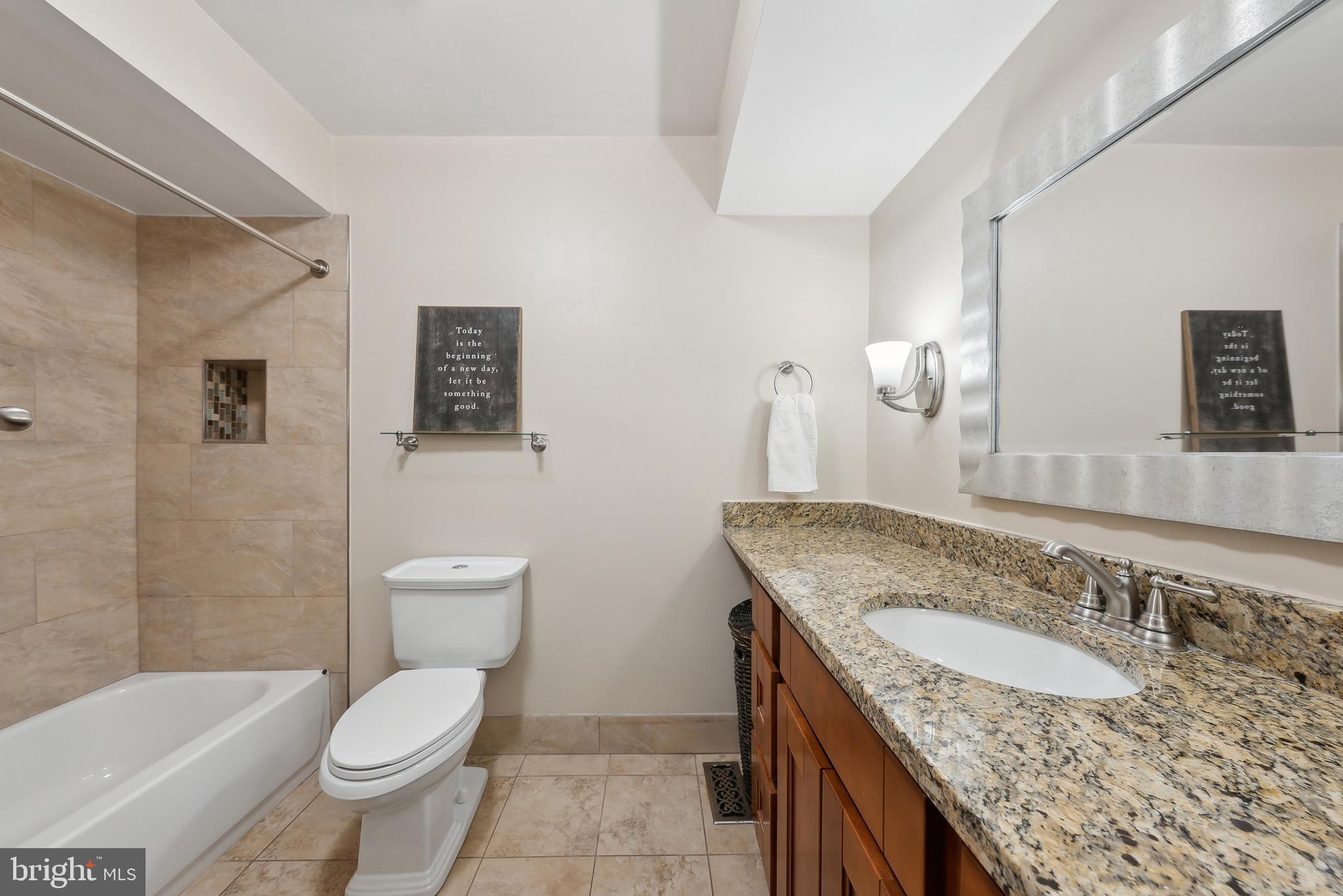 3011 Bluff Point Lane Silver Spring, MD 20906 - Photo 19 of 29 Main level full bath with tub