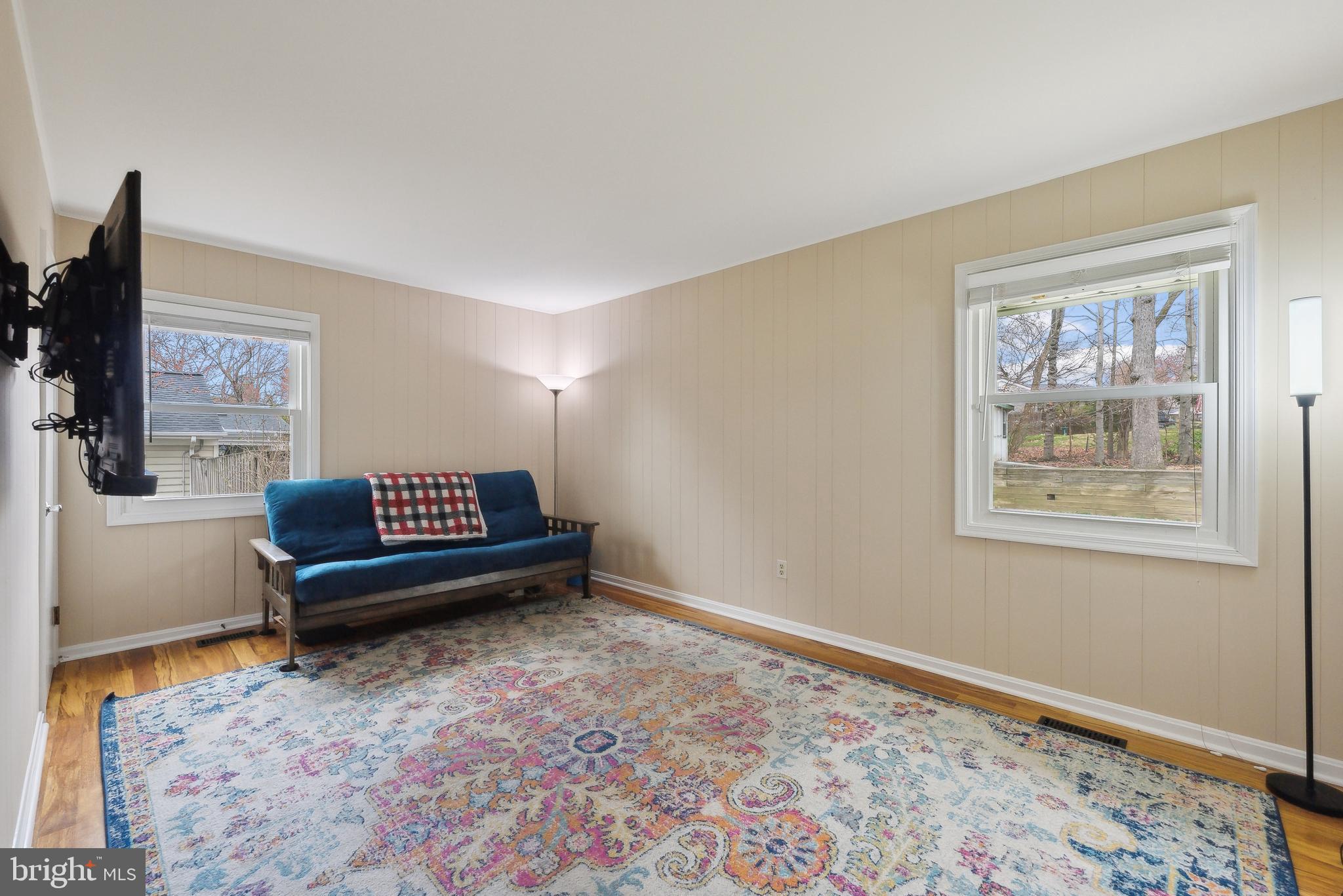 3011 Bluff Point Lane Silver Spring, MD 20906 - Photo 20 of 29 Main level bedroom #2 with wood floors
