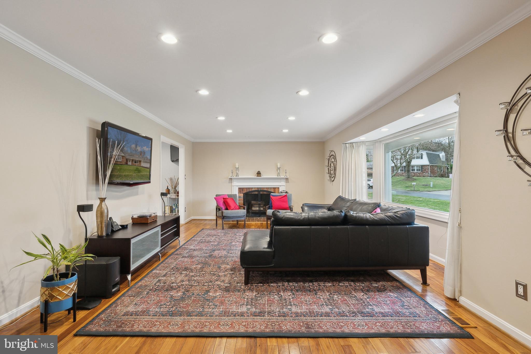 3011 Bluff Point Lane Silver Spring, MD 20906 - Photo 6 of 29 Formal living room with wood burning fireplace