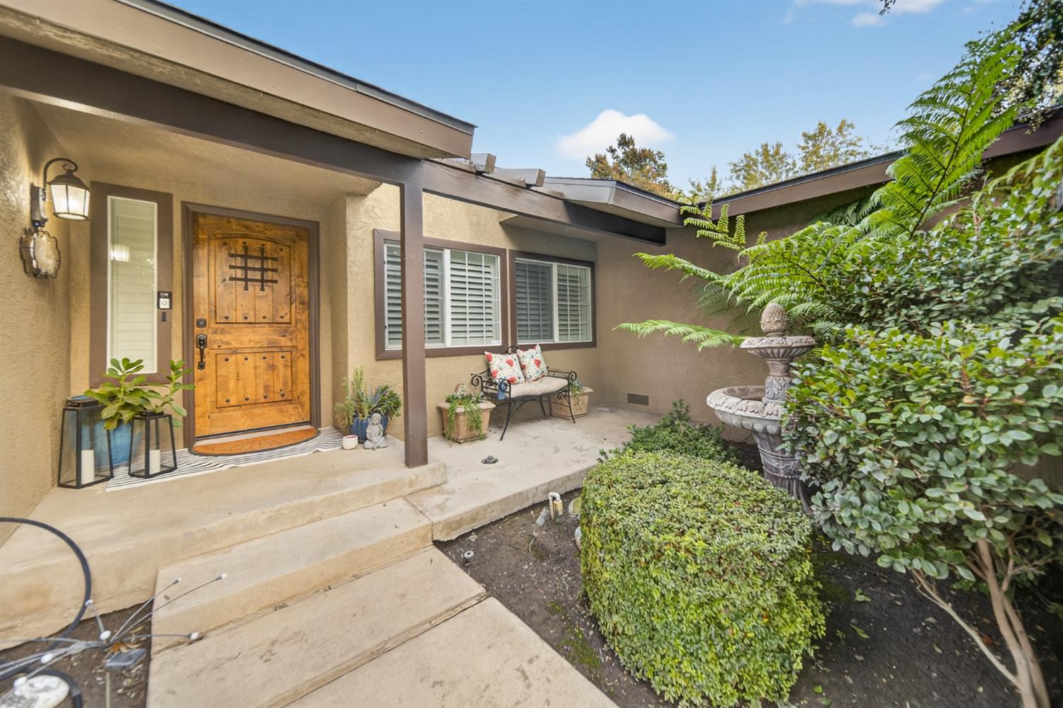 101 Mainberry Drive Madera, CA 93637 - Photo 3 of 40 a bathroom with a sink mirror and vanity