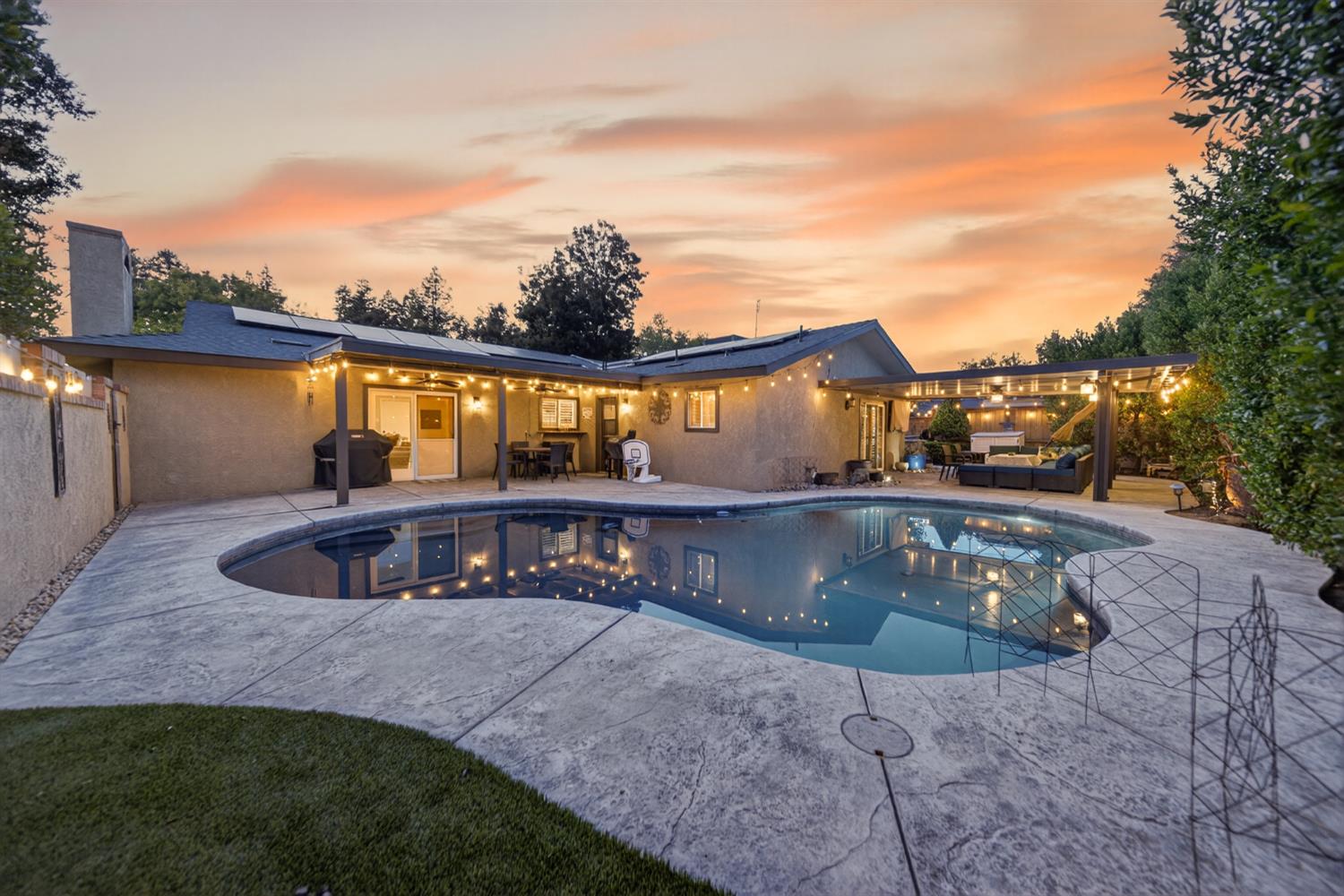 101 Mainberry Drive Madera, CA 93637 - Photo 36 of 40 a front view of house with outdoor space and seating