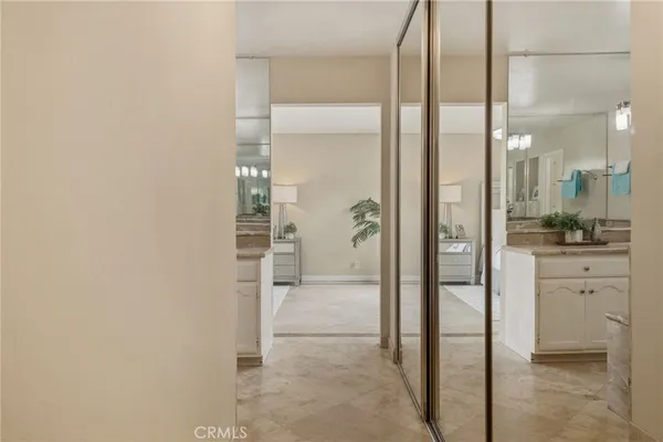 a bathroom with a shower and a sink