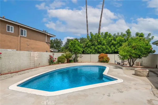 a view of outdoor space and swimming pool
