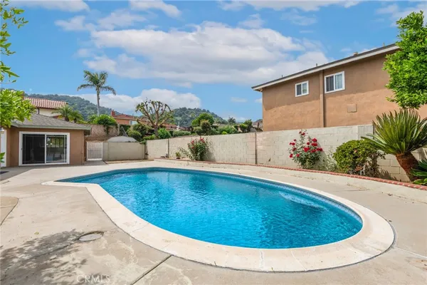a view of outdoor space and swimming pool