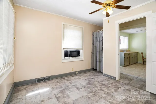 a kitchen with a sink appliances and cabinets