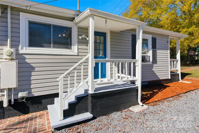 a house view with a backyard space