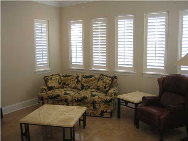 4466 Stonebridge Road Destin, FL 32541 - Photo 16 of 21 a living room with furniture and a window