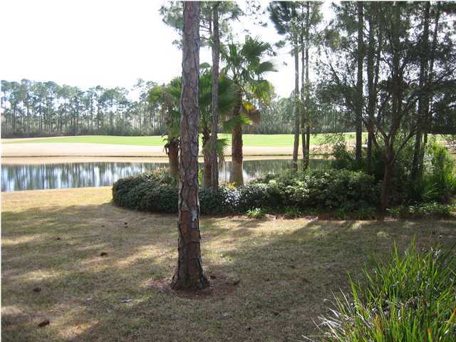 4466 Stonebridge Road Destin, FL 32541 - Photo 20 of 21 a view of a yard with a tree