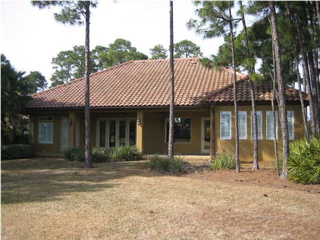 4466 Stonebridge Road Destin, FL 32541 - Photo 21 of 21 a front view of a house with garden