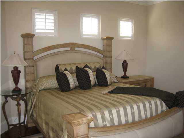 4466 Stonebridge Road Destin, FL 32541 - Photo 9 of 21 a bedroom with a bed and window