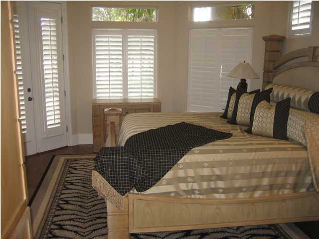 4466 Stonebridge Road Destin, FL 32541 - Photo 10 of 21 a bedroom with a bed and window