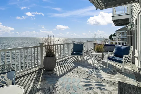a view of balcony with furniture