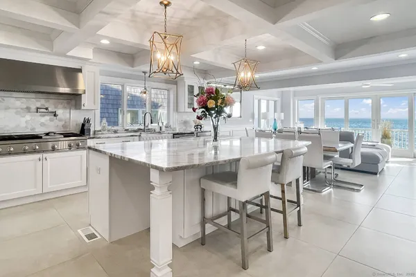 a kitchen with counter top space appliances and cabinets