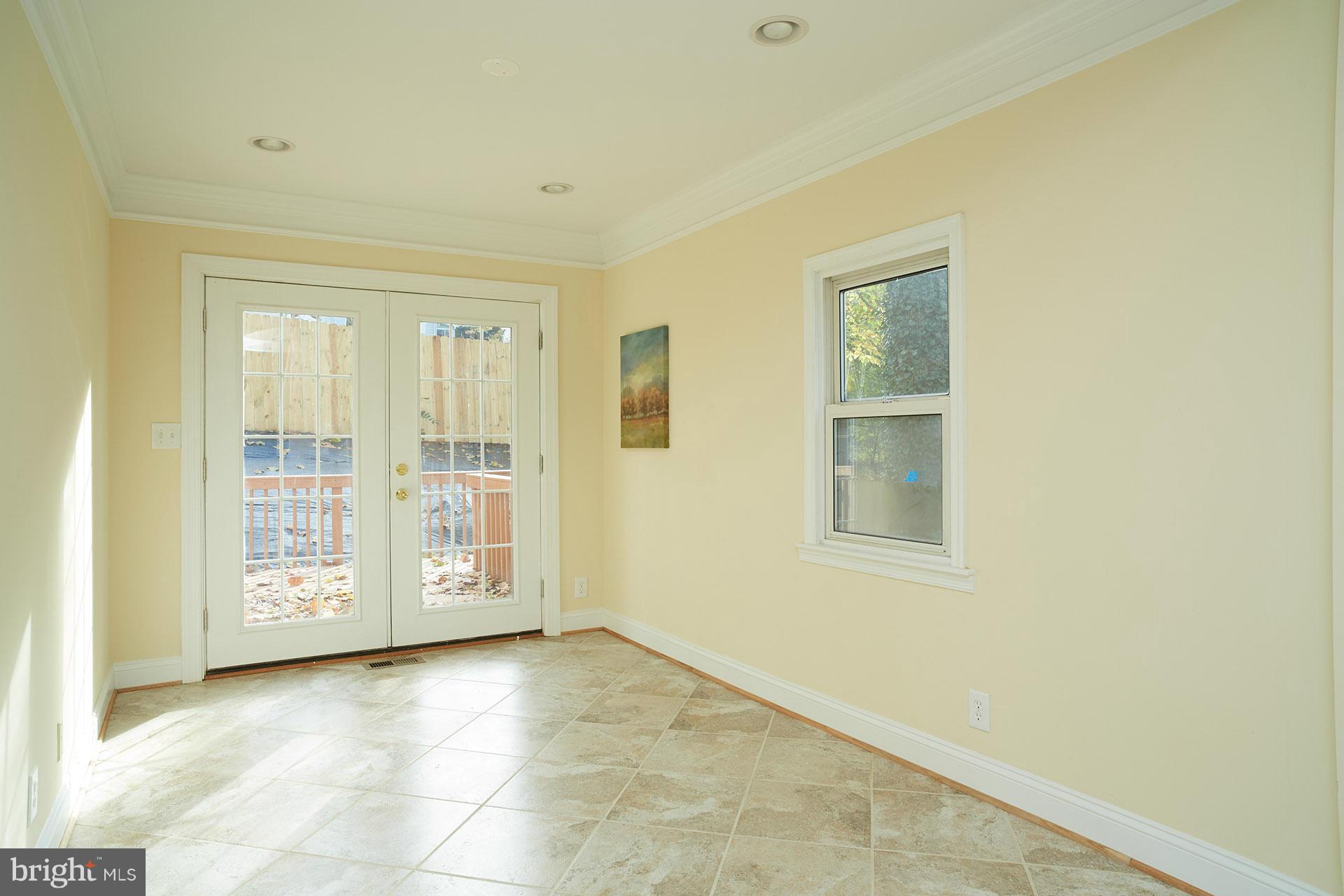 11805 Dewey Road Silver Spring, MD 20906 - Photo 13 of 30 a view of an empty room with a window