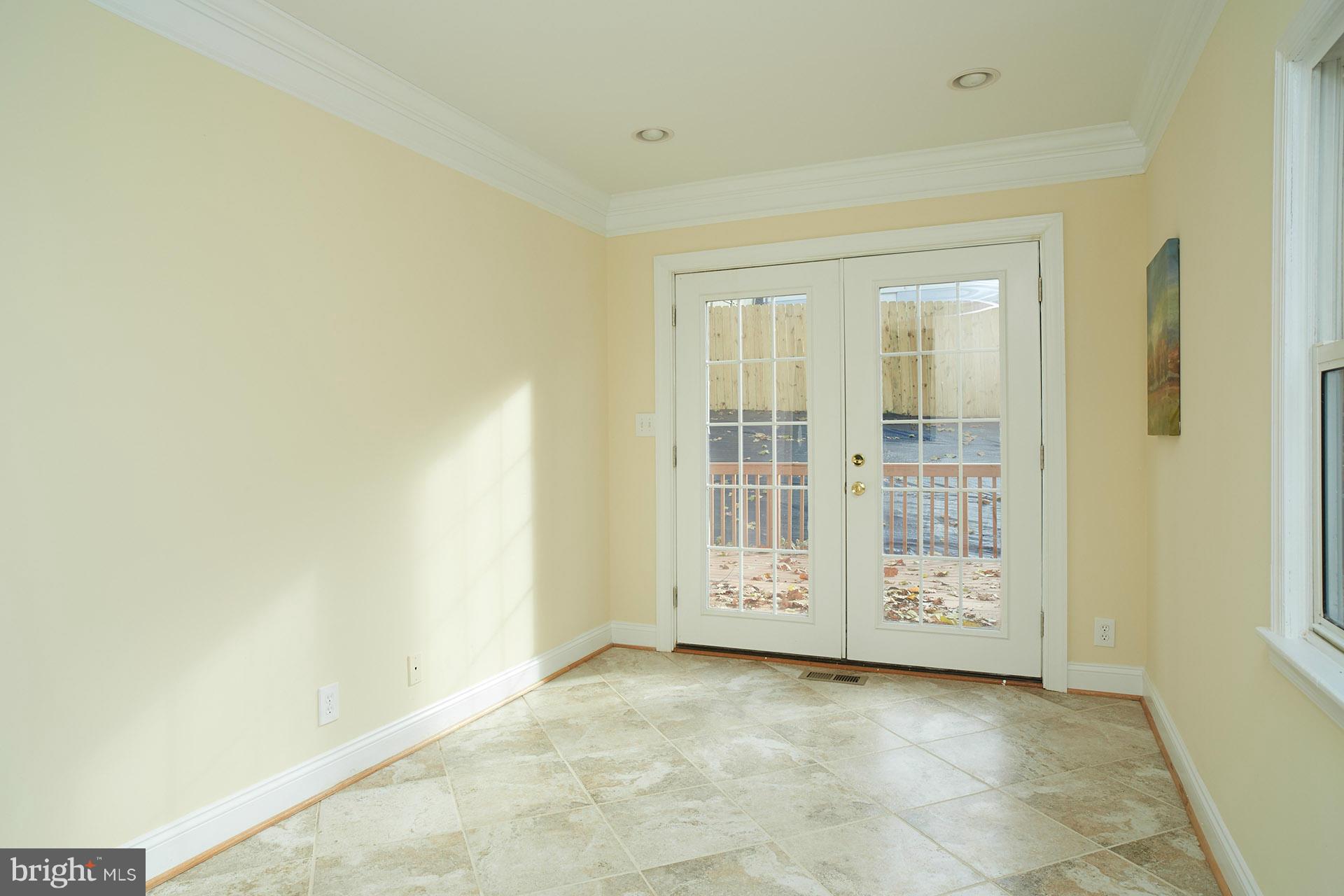11805 Dewey Road Silver Spring, MD 20906 - Photo 14 of 30 an empty room with windows