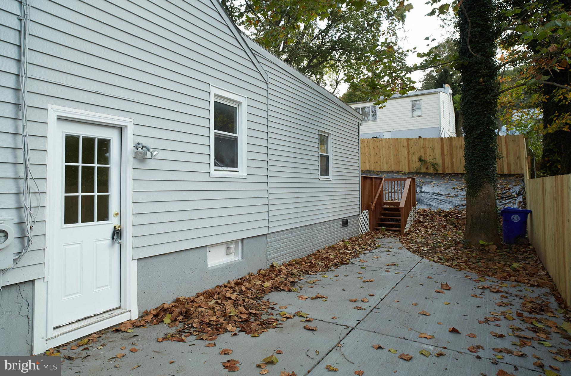 11805 Dewey Road Silver Spring, MD 20906 - Photo 3 of 30 a view of a house with a yard