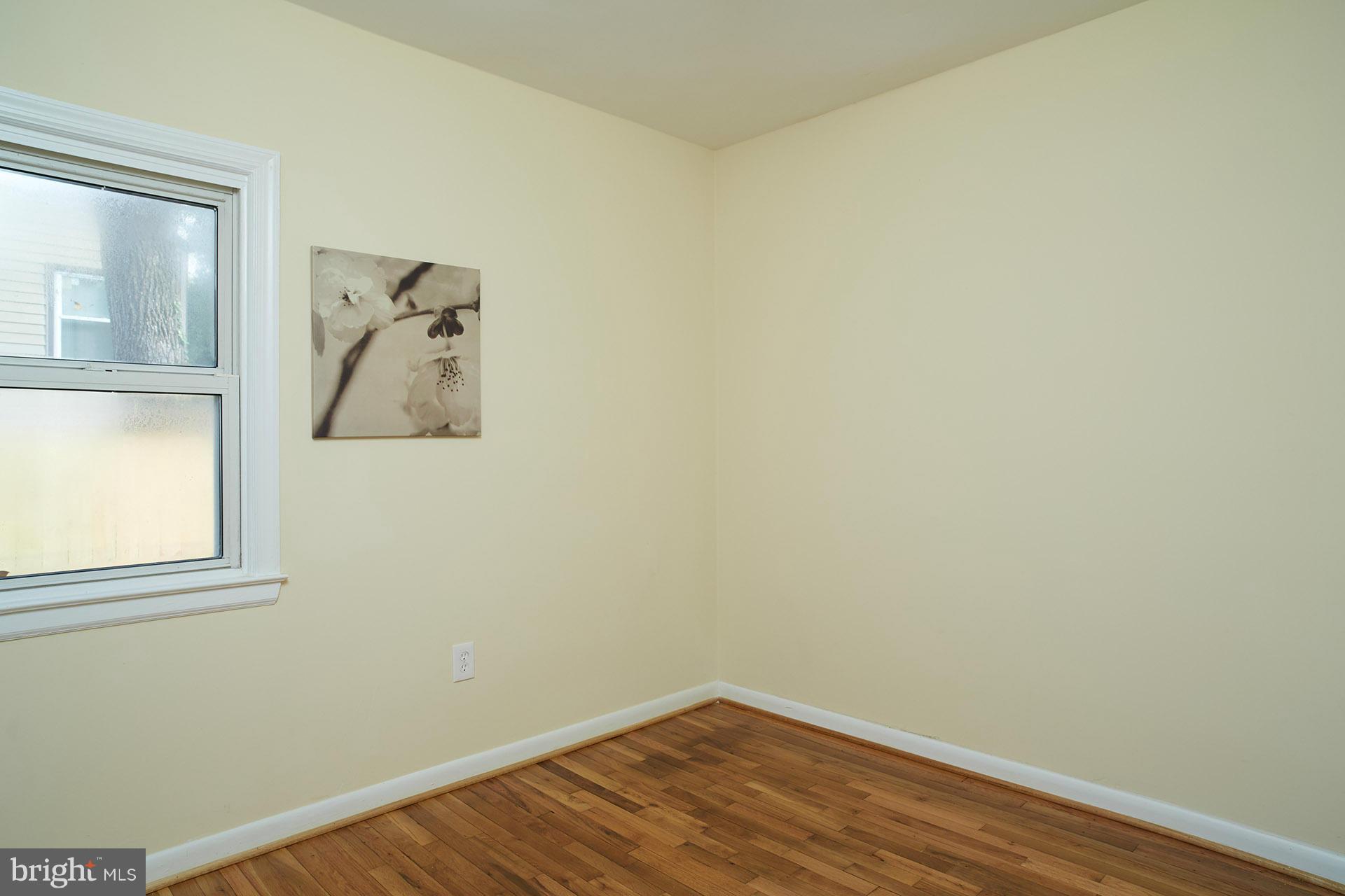 11805 Dewey Road Silver Spring, MD 20906 - Photo 21 of 30 a view of a small space with wooden floor and a window