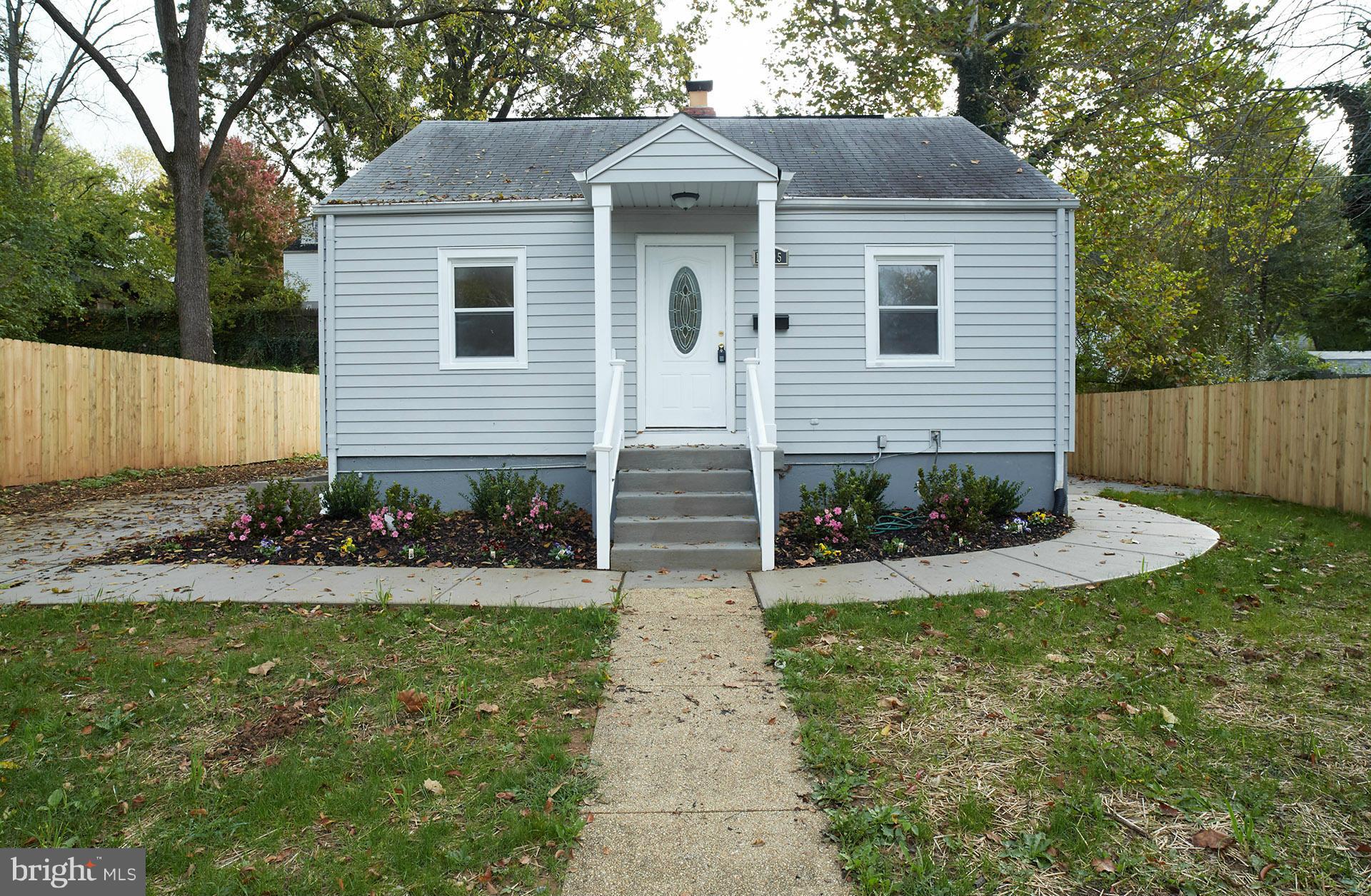 11805 Dewey Road Silver Spring, MD 20906 - Photo 27 of 30 a front view of house with yard and green space