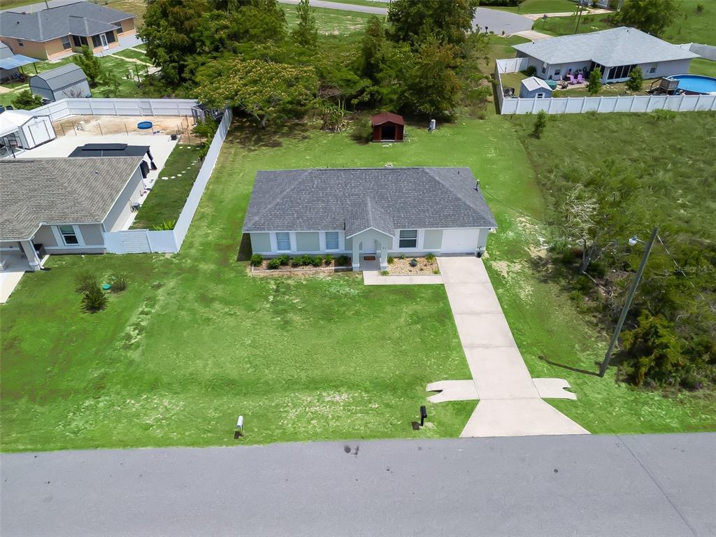 27 Juniper Loop Terrace Ocala, FL 34480 - Photo 34 of 35 an aerial view of a house