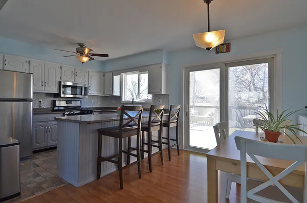 a view of a dining room with furniture window and outside view