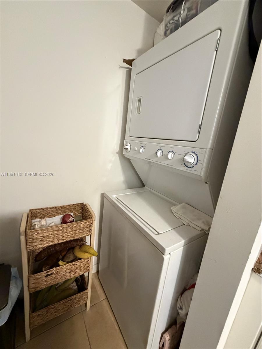 215 Southwest 42nd Avenue, Unit 803 Miami, FL 33134 - Photo 14 of 20 a utility room with dryer and washer