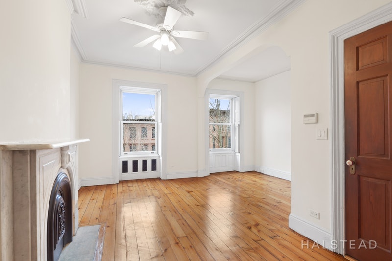 192 6th Avenue Brooklyn, NY 11217 - Photo 12 of 20 wooden floor in an empty room with a window