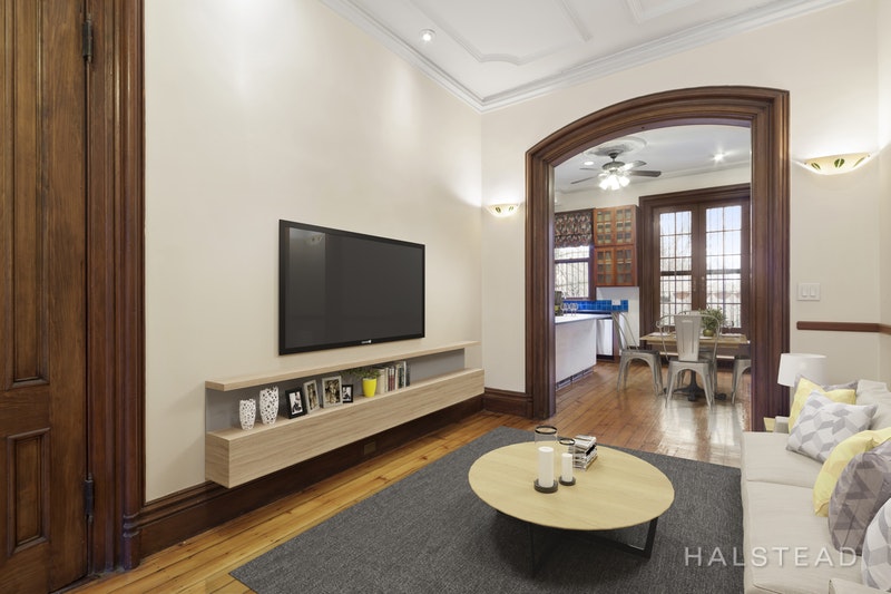192 6th Avenue Brooklyn, NY 11217 - Photo 4 of 20 a living room with furniture and a flat screen tv