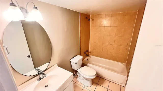 a bathroom with a toilet and a sink