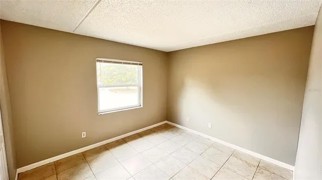 a view of an empty room with window