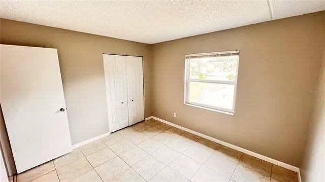 a view of a room with white walls