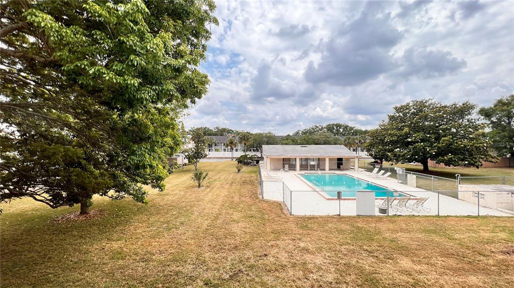 1902 Honour Road, Unit 24 Orlando, FL 32839 - Photo 25 of 25 a view of a house with a yard