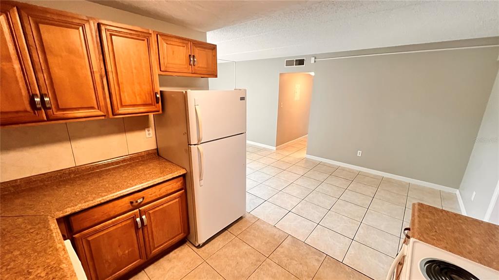 1902 Honour Road, Unit 24 Orlando, FL 32839 - Photo 8 of 25 a utility room with dryer and washer