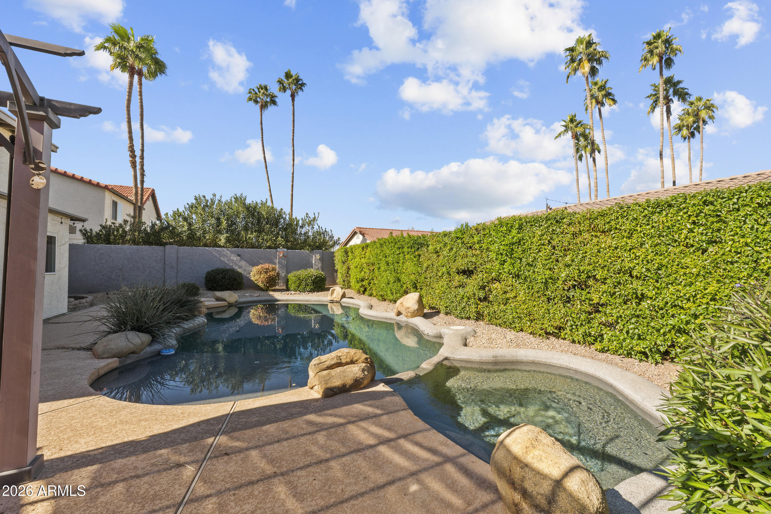 1608 East Weathervane Lane Tempe, AZ 85283 - Photo 27 of 33 a view of a swimming pool with a patio