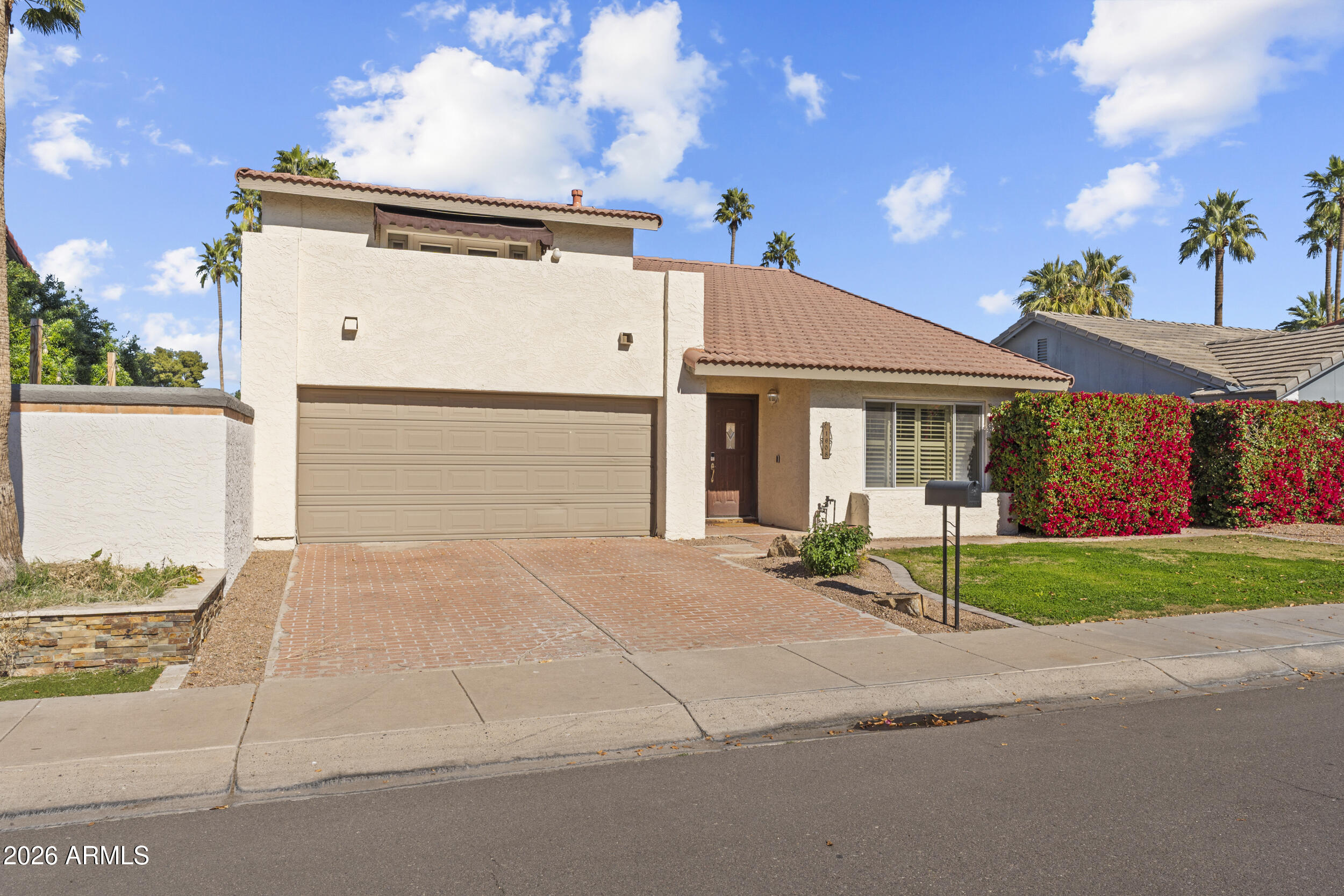 1608 East Weathervane Lane Tempe, AZ 85283 - Photo 2 of 33 a view of a house with backyard and porch