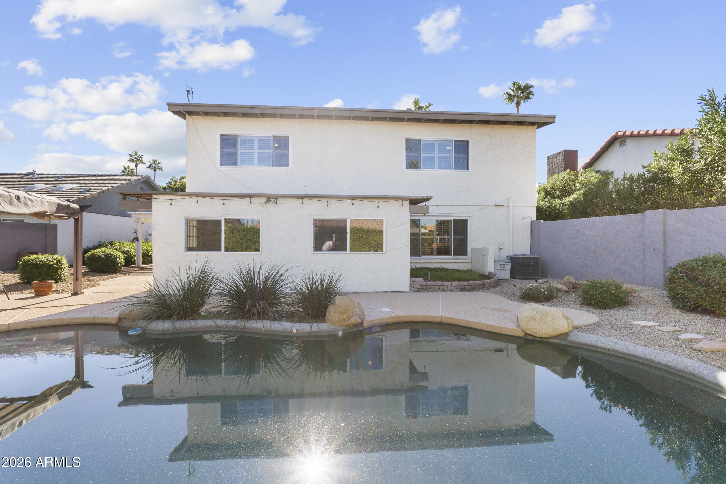1608 East Weathervane Lane Tempe, AZ 85283 - Photo 30 of 33 a view of a house with pool table and chairs