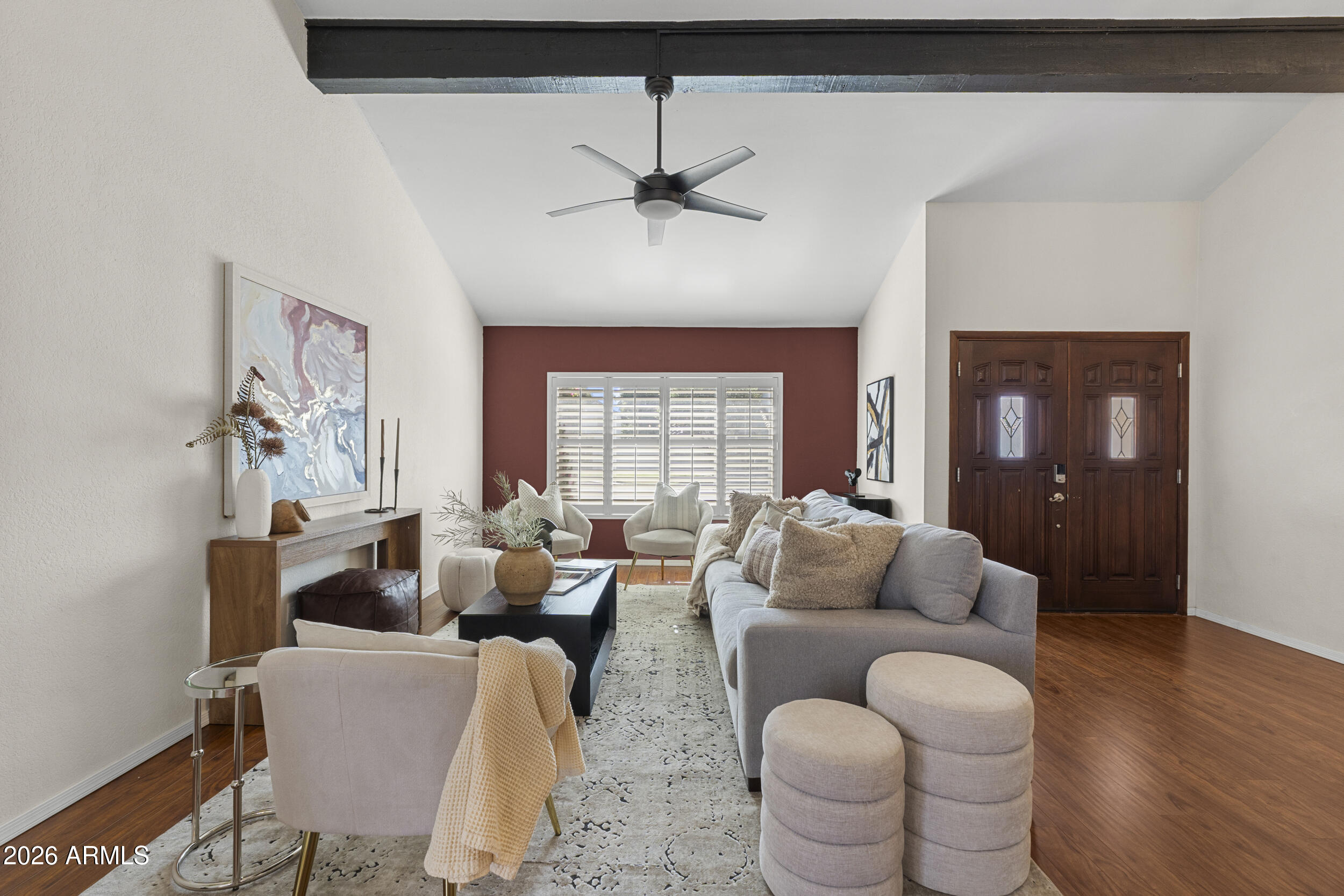 1608 East Weathervane Lane Tempe, AZ 85283 - Photo 4 of 33 a living room with furniture a chandelier and a window