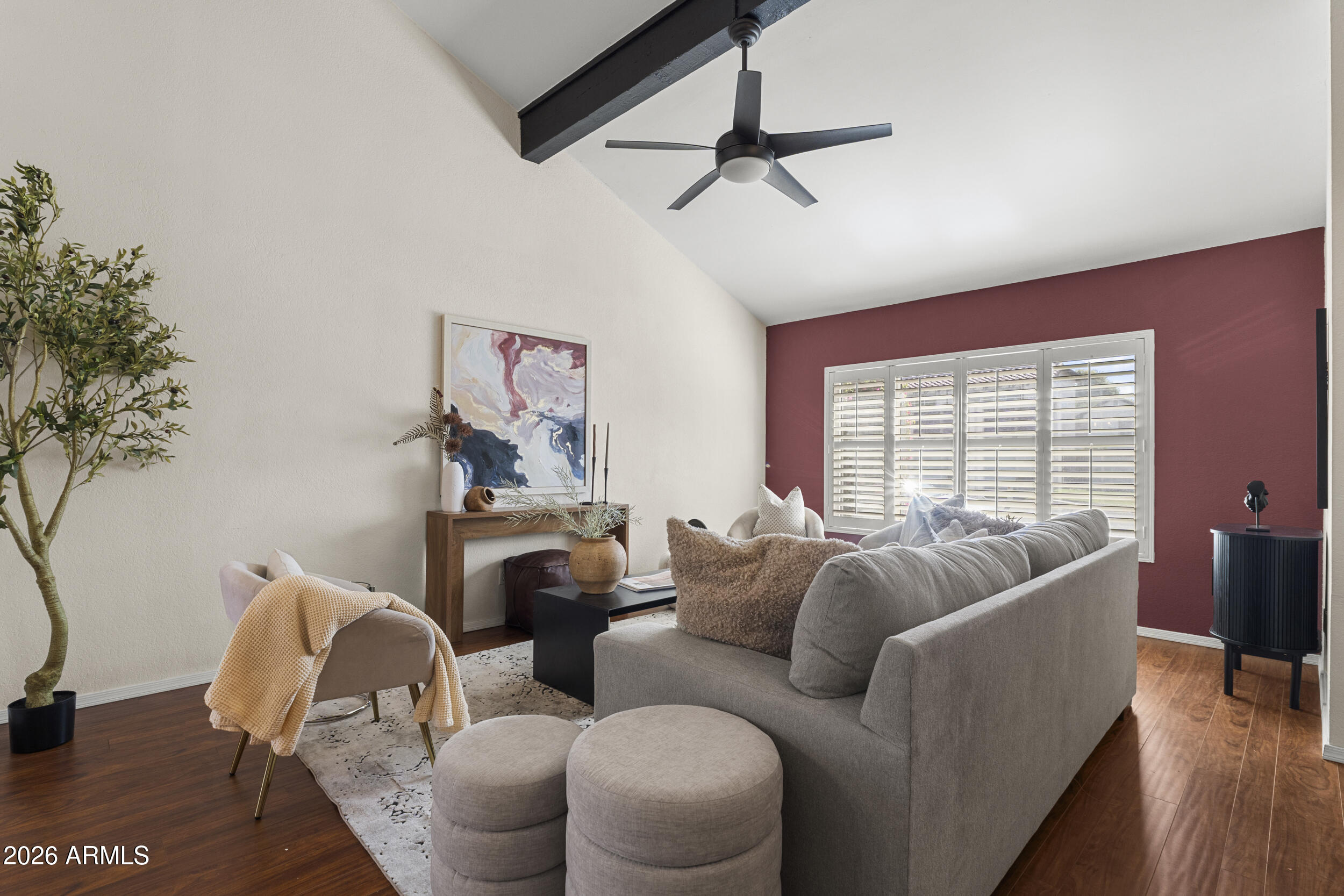 1608 East Weathervane Lane Tempe, AZ 85283 - Photo 5 of 33 a living room with furniture and a large window