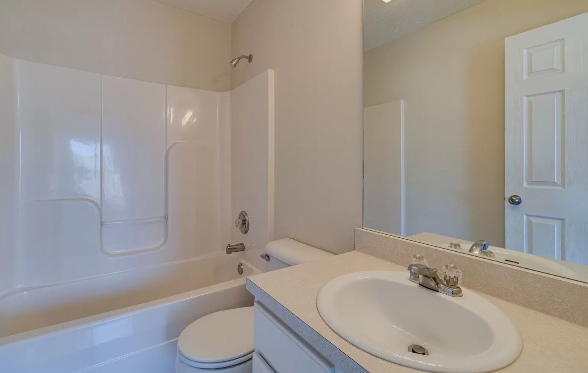 562 Flintlock Court Nashville, TN 37217 - Photo 16 of 20 a bathroom with a sink toilet and shower