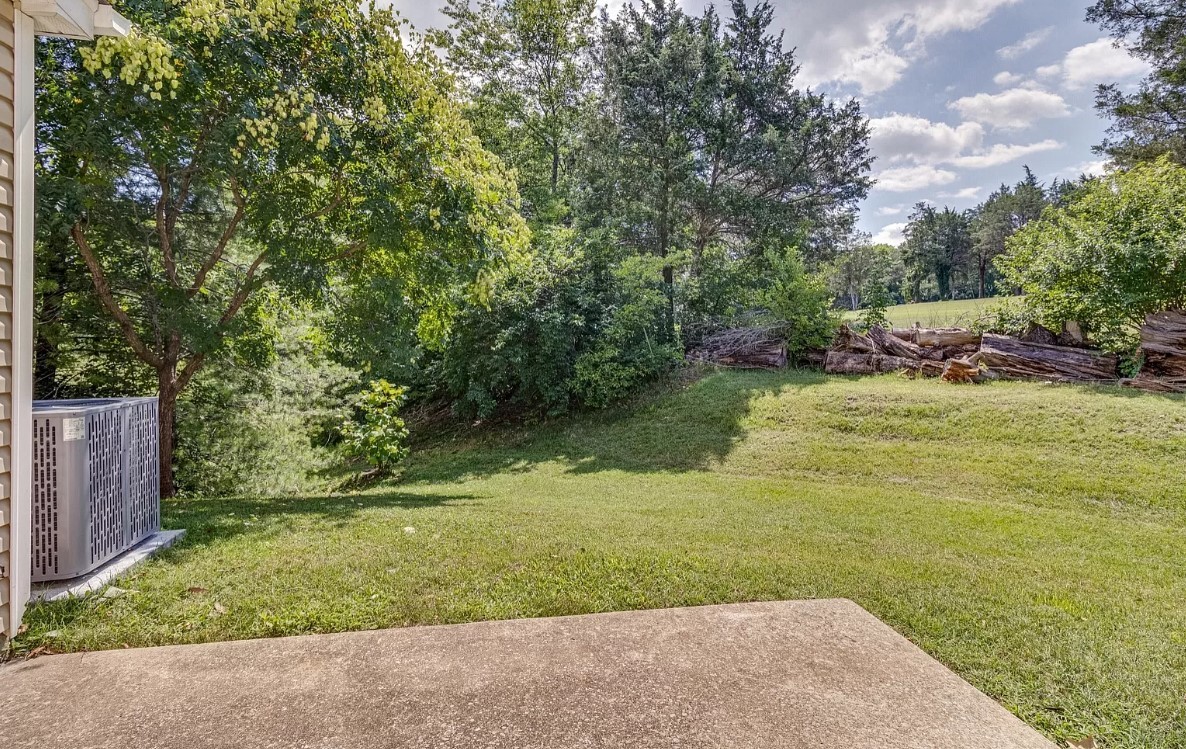 562 Flintlock Court Nashville, TN 37217 - Photo 18 of 20 a view of a golf course with chairs