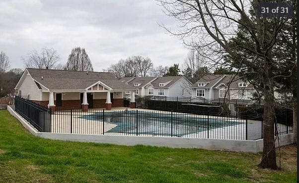 562 Flintlock Court Nashville, TN 37217 - Photo 20 of 20 a view of a house with a big yard and large tree