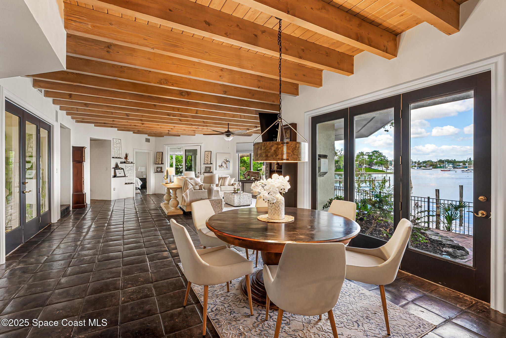 1025 Terry Drive Melbourne, FL 32935 - Photo 15 of 72 a view of a dining room with furniture window and outside view