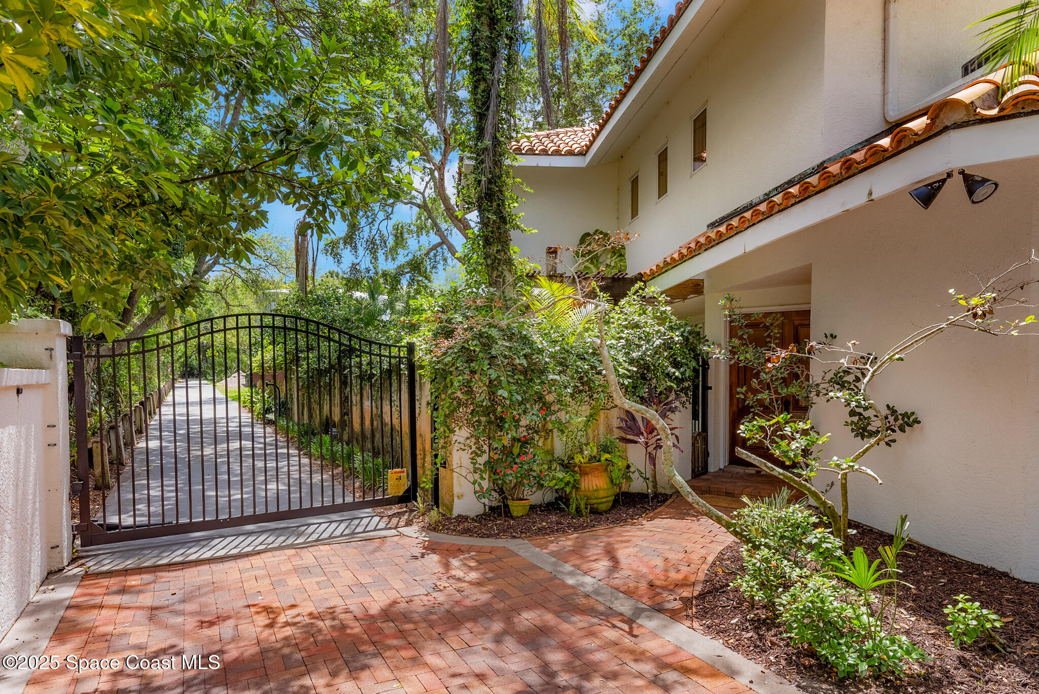 1025 Terry Drive Melbourne, FL 32935 - Photo 2 of 72 a view of a pathway of a building